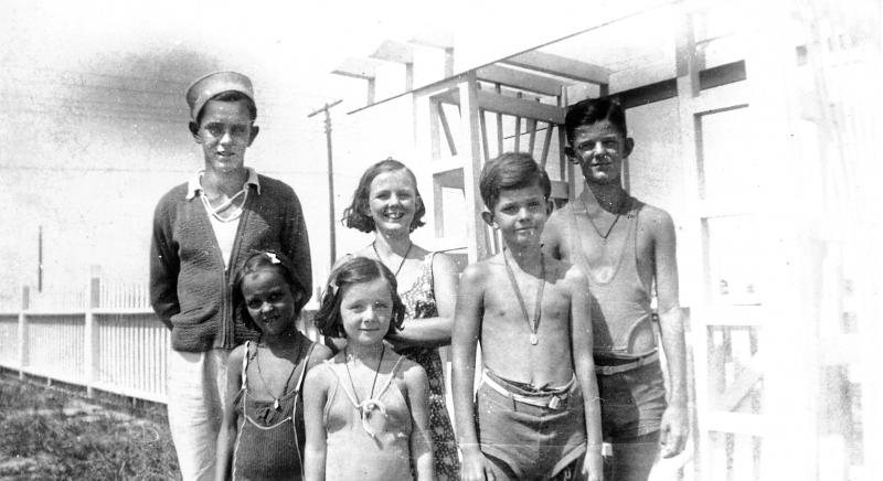 In front of the old Walsh cottage are in back (l-r) Jimmy, Mary and Jackie; in front are an unknown family friend, and Joan and Jerry Walsh. WALSH FAMILY PHOTO